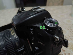 Nikon d7100 objectif 18 105 batterie chargeur déclenchement