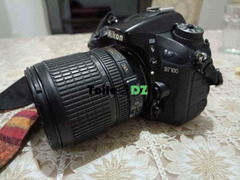 Nikon d7100 objectif 18 105 batterie chargeur déclenchement